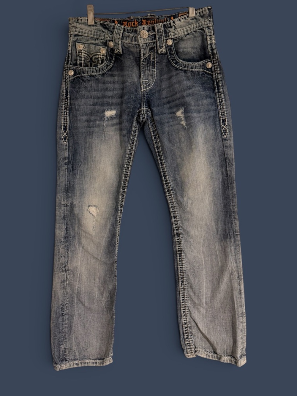 Rock Revival Men's Faded Distressed Kasper Slim Boot jeans.